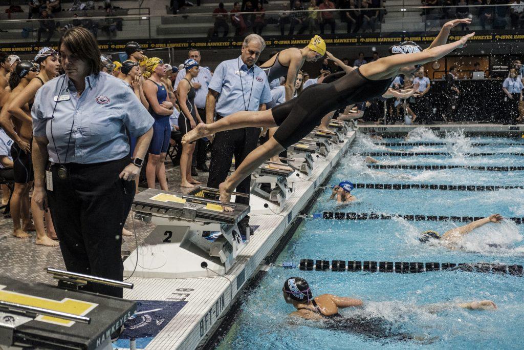 Swimmers compete during day three of the USA Swimming West Junior Nationals in Iowa City on Saturday, Dec. 9, 2017. (Nick Rohlman/The Daily Iowan)