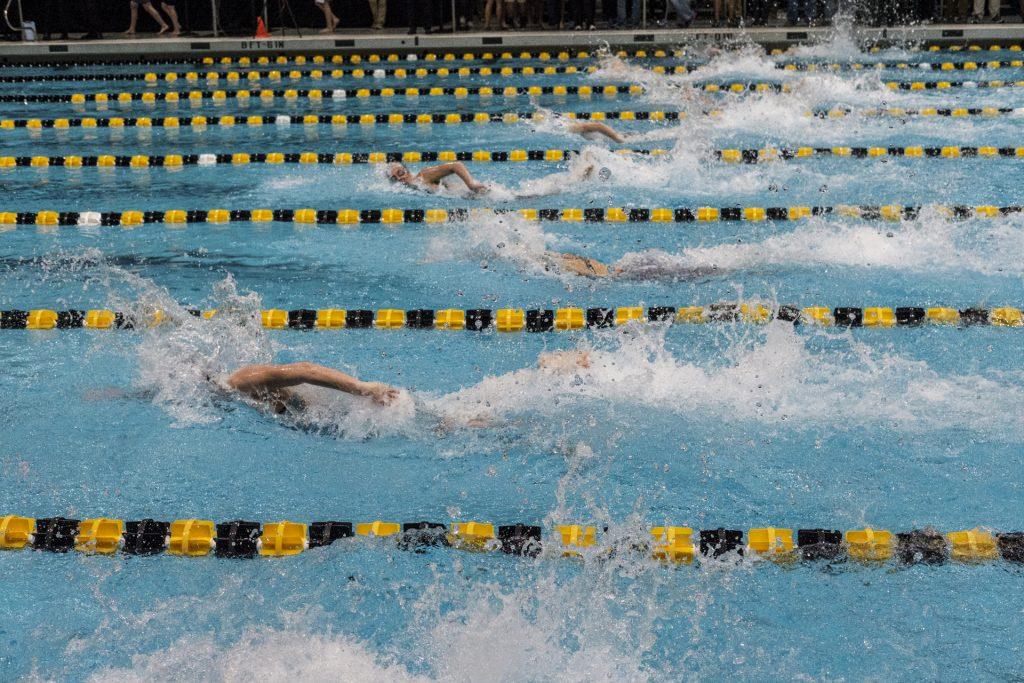 Swimmers compete during day three of the USA Swimming West Junior Nationals in Iowa City on Saturday, Dec. 9, 2017. (Nick Rohlman/The Daily Iowan)