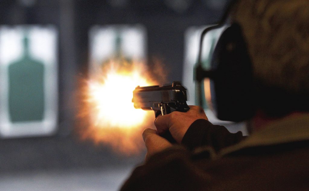Ernie Vandergriff fires at a target during a class for a concealed handgun license at The Shooting Gallery in Fort Worth, Texas, January 17, 2013. (Ron Jenkins/Fort Worth Star-Telegram/MCT)