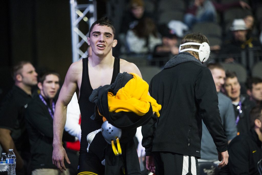 Iowas 133-pound Paul Glynn smiles after a victory during the first session of the 55th Annual Midlands Championships in the Sears Centre in Hoffman Estates, Illinois, on Friday, Dec. 29, 2017. (Joseph Cress/The Daily Iowan)
