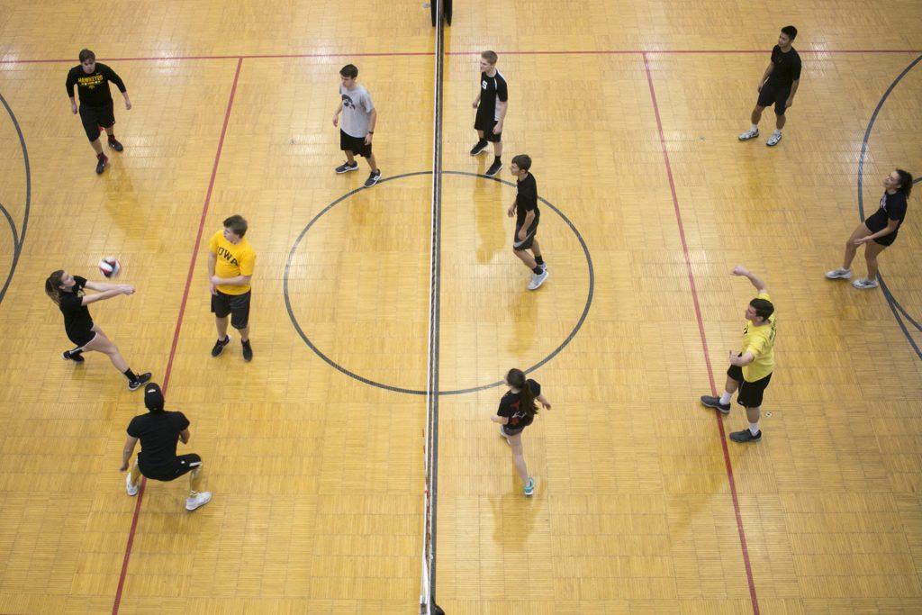 University of Iowa students play a charity game of volleyball in the Field House on Sunday, Dec. 3, 2017. The money raised from the event is going to go towards building water wells in other countries. (Joseph Cress/The Daily Iowan)