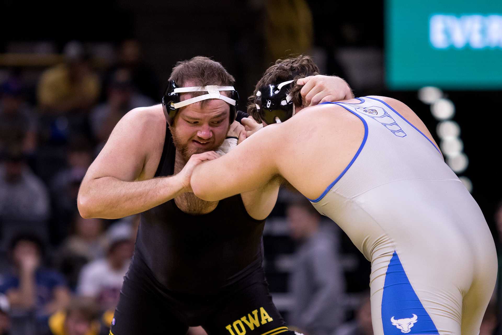 Iowa’s Sam Stoll wrestles with the University of Buffalo’s Jake Gunning in the 285-lb weight class on Friday, Nov. 17, 2017. Stoll defeated Gunning by a score of 4-3. (David Harmantas/The Daily Iowan)