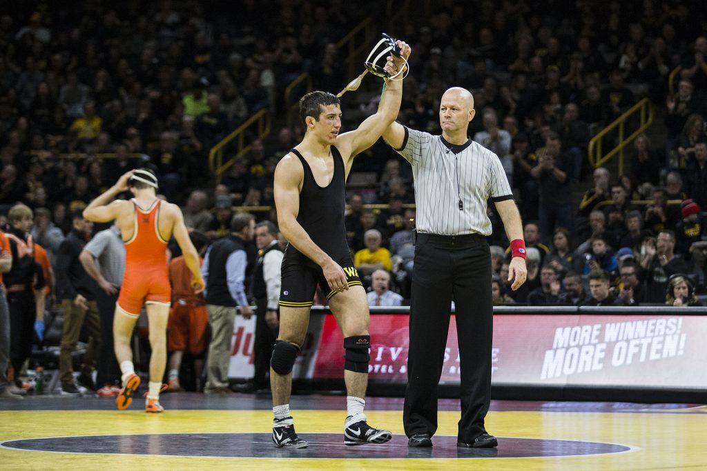 Iowas Michael Kemerer defeats Oklahoma States Jonce Blaylock 9-2 in the 157-pound weight class during the NCAA wrestling meet between Iowa and Oklahoma State at Carver-Hawkeye Arena on Sunday, Jan. 14. The #7 ranked Hawkeyes beat the #3 ranked Cowboys 20-12. (Ben Allan Smith/The Daily Iowan)
