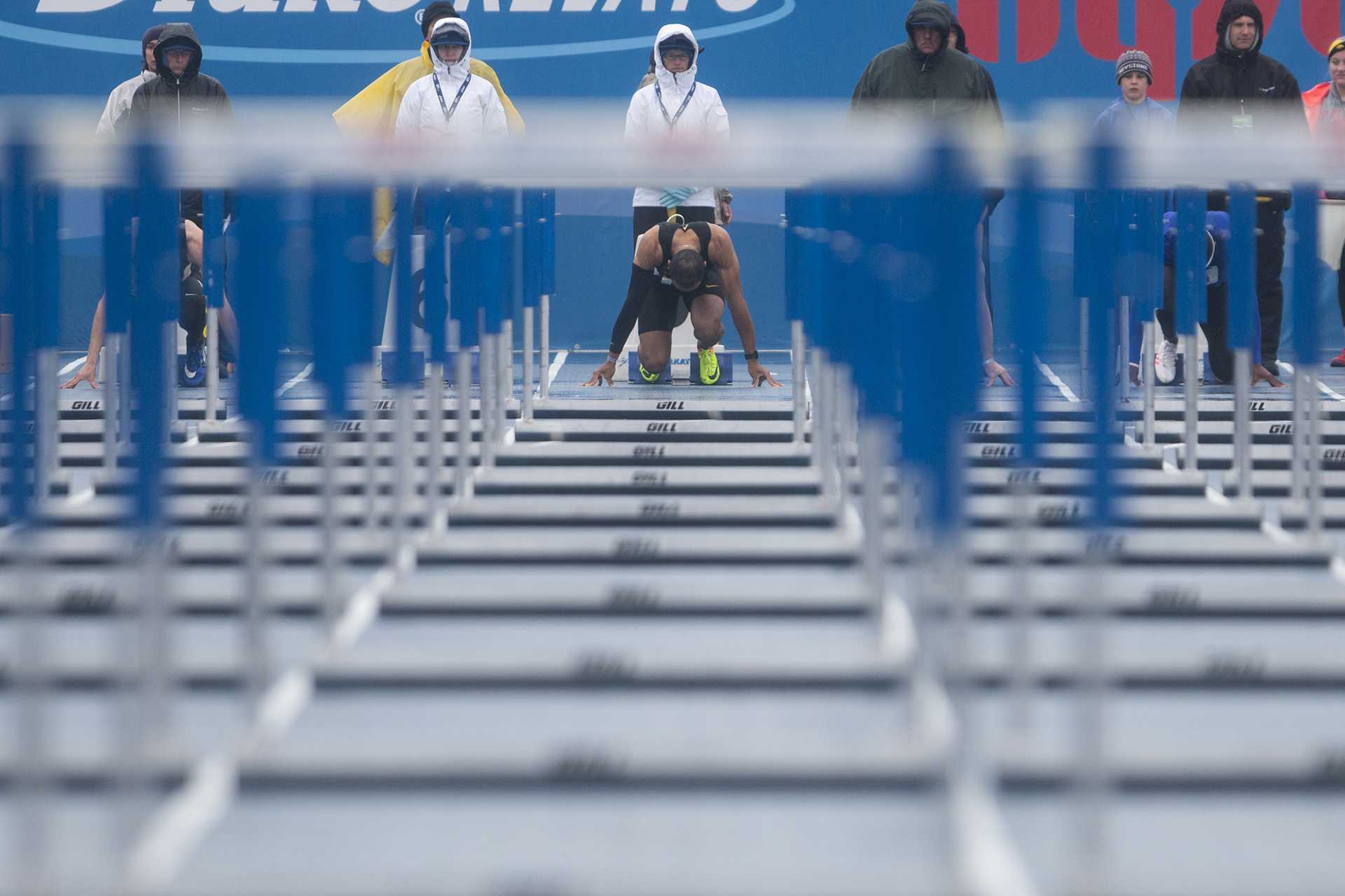 Iowas Aaron Mallet waits on starting blocks during the 110-meter hurdles at Drake Stadium during the Drake Relays on Saturday, April 29, 2017. Mallet won with a time of, 13.47. (The Daily Iowan/Joseph Cress)