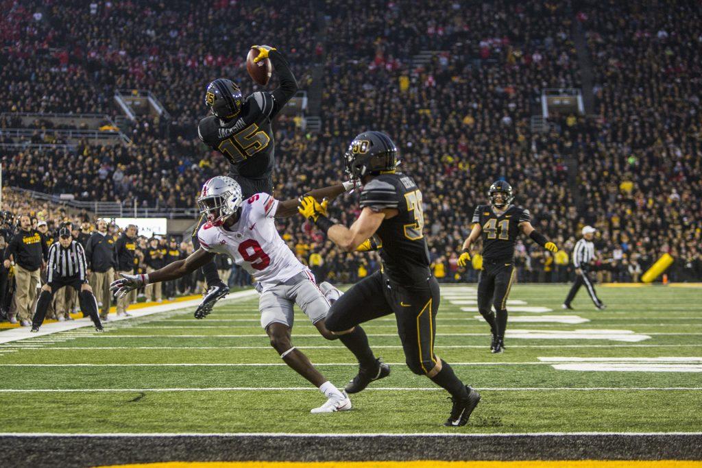 Iowa cornerback Josh Jackson makes a jumping one handed interception during Iowas game against Ohio State at Kinnick Stadium on Saturday, Nov. 4, 2017. Jackson made three interceptions on the day as the Hawkeyes defeated the Buckeyes, 55-24. (Nick Rohlman/The Daily Iowan)