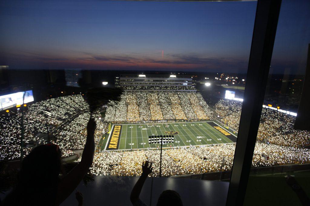 Fans at Kinnick wave to the children and their families at the Stead Family Childrens Hospital in Iowa City Saturday Sep. 23, 2017. 