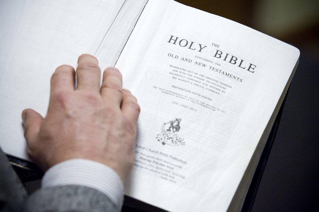 Pastor Chris Huff, of Bible Baptist Church, in Mount Prospect, Illinois, holds his copy of the King James translation of the Bible, March 2, 2011. (Darrell Goemaat/Chicago Tribune/TNS)