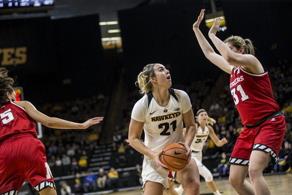 during the NCAA womens basketball game at Carver-Hawkeye Arena on Sunday, Jan. 28, 2018. The Cornhuskers defeated the Hawkeyes 92-74. Junior, Hannah Stewart goes up for a basket in the paint. (Chris Kalous/The Daily Iowan)