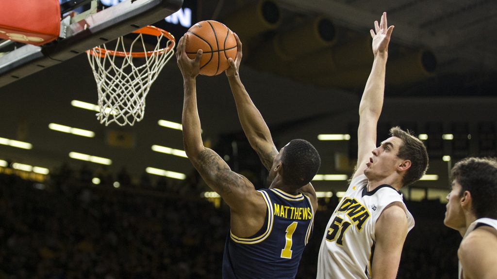 Michigan+guard+Charles+Matthews+%281%29+dunks+the+ball+in+front+of+Iowas+Nicholas+Baer+%2851%29+during+the+NCAA+basketball+game+between+Iowa+and+Michigan+at+Carver-Hawkeye+Arena+on+Tuesday%2C+Jan.+2%2C+2017.+The+Hawkeyes+fell+to+the+Wolverines+75-68.+%28Ben+Allan+Smith%2FThe+Daily+Iowan%29