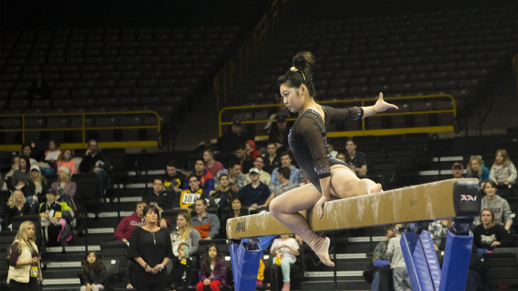 Iowas+Clair+Kaji+performs+on+the+beam+during+the+Iowa%2FOhio+State+gymnastics+meet+in+Carver-Hawkeye+Arena+on+Friday%2C+Jan.+19%2C+2018.+The+GymHawks+defeated+the+Buckeyes%2C+195.725+to+195.300%2C+to+win+their+home+opener.+%28Lily+Smith%2FThe+Daily+Iowan%29