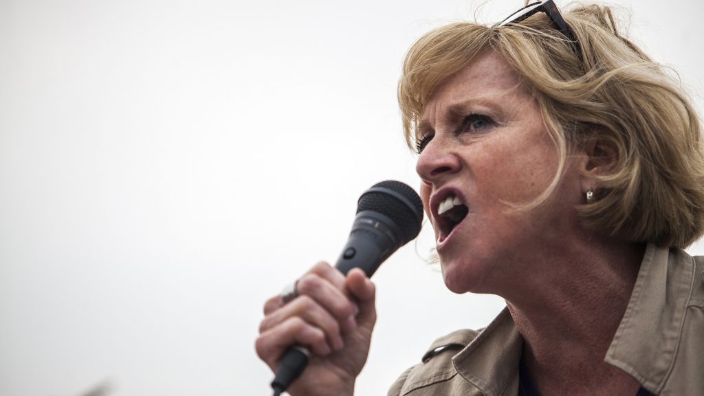 Gubernatorial candidate and SEIU Local 199 President, Cathy Glasson, speaks to a crowd during a Labour Walkout event in Des Moines on Monday, Sept. 4, 2017. Organizations in support of laborers across Iowa such as Service Employees International Union, Iowa Citizens for Community Improvement, and Democratic Socialists of America participated in the rally. (Ben Smith/The Daily Iowan)