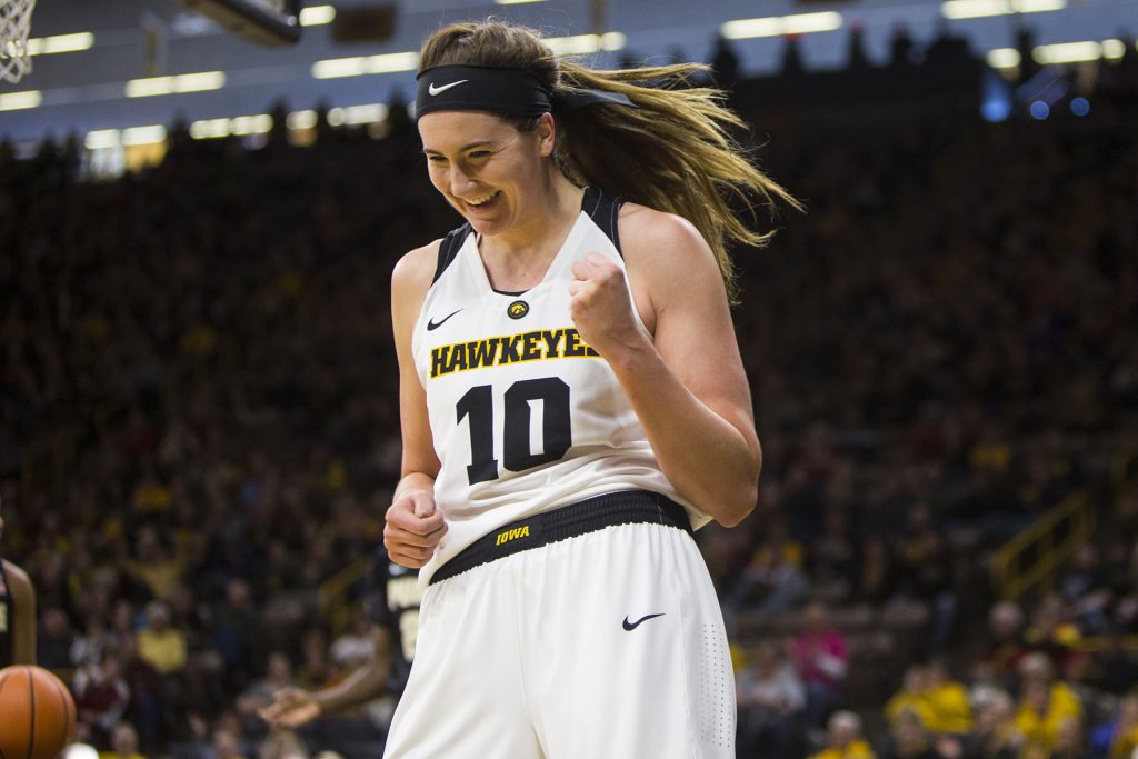 Iowa center Megan Gustafson celebrates after drawing a foul while making a basket during an Iowa/Purdue womens basketball game in Carver-Hawkeye Arena on Saturday, Jan. 13, 2018. The Boilermakers defeated the Hawkeyes, 76-70. (Joseph Cress/The Daily Iowan)