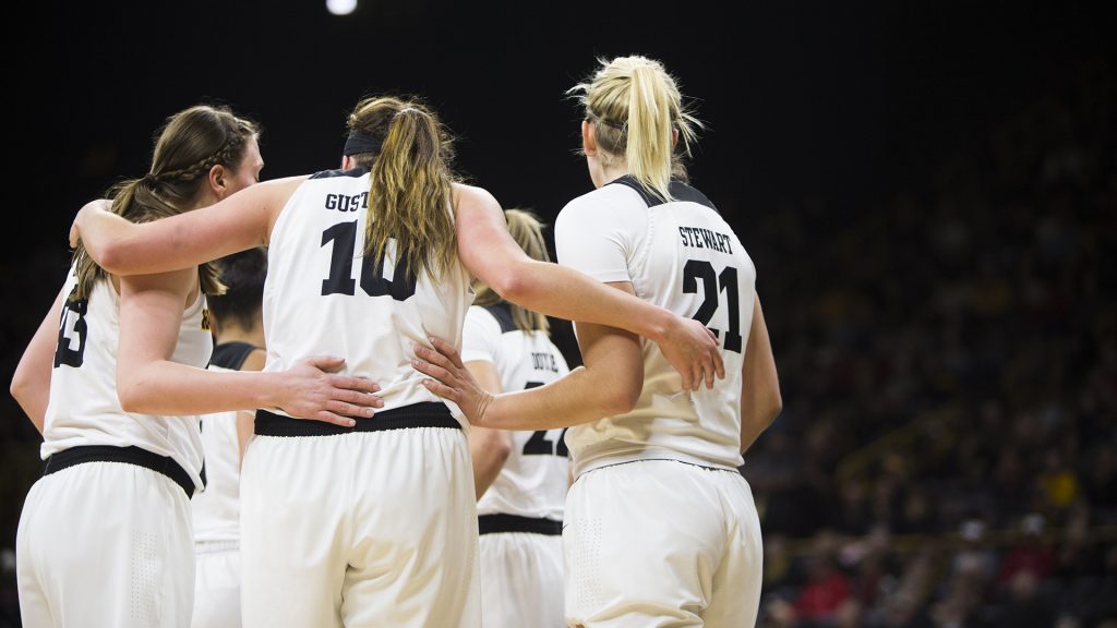 Iowa center Megan Gustafson huddles with teammates before shooting free throws after drawing a foul while making a basket during an Iowa/Purdue womens basketball game in Carver-Hawkeye Arena on Saturday, Jan. 13, 2018. The Boilermakers defeated the Hawkeyes, 76-70. (Joseph Cress/The Daily Iowan)