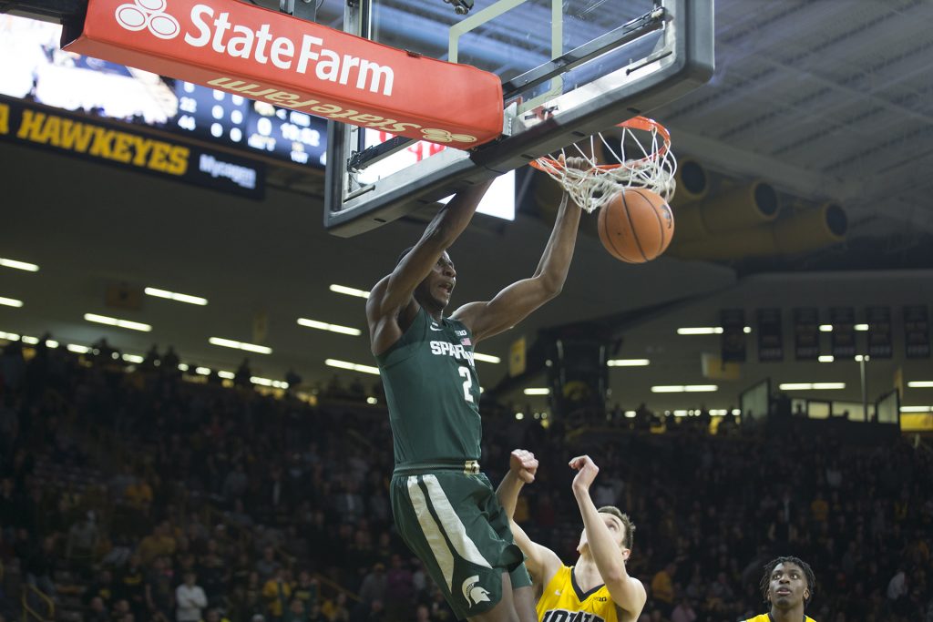 Michigan State F Jaren Jackson dunks a ball during a basketball game between Iowa and Michigan State at Carver-Hawkeye Arena on Tuesday, Feb. 6, 2018. The Hawkeyes were defeated by the visiting Spartans, 96-93. (Shivansh Ahuja/The Daily Iowan)