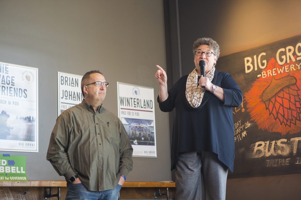Rep. Mary Mascher, D-Iowa City, introduces Iowa Democratic gubernatorial candidate Fred Hubbell alongside Johnson Country sheriff Lonny Pulkrabek at Big Grove Brewery and Taproom on Sunday, Feb. 4, 2018. (Lily Smith/The Daily Iowan)