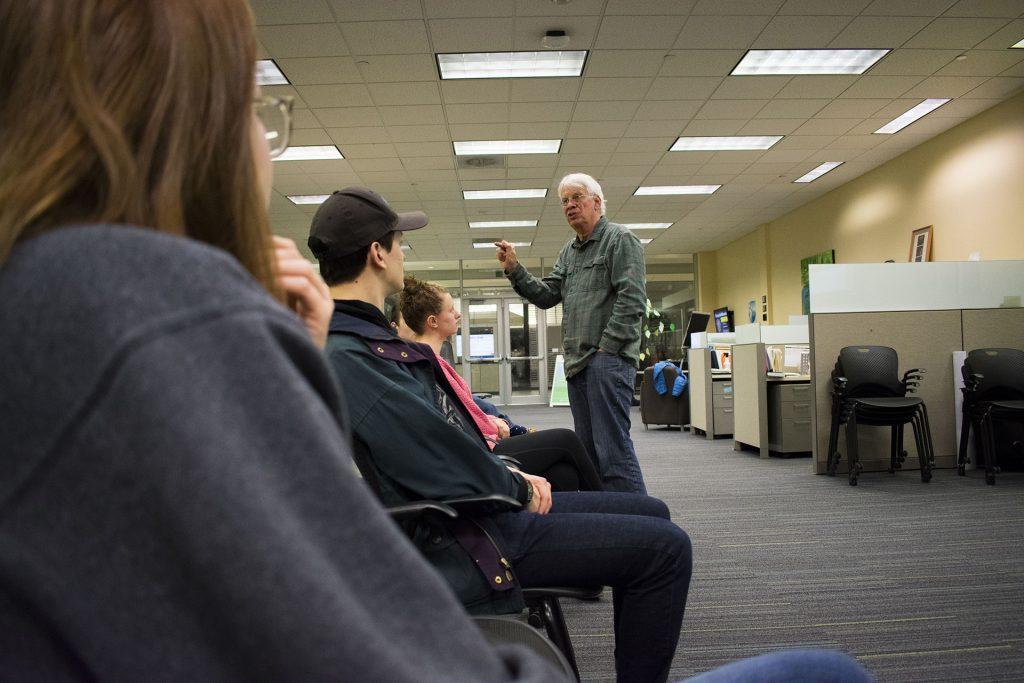 Dave Collins, a professor of Marketing and Sustainability at the University of Iowa speaks to a crowd of students on February 22nd.  (Sid Peterson /The Daily Iowan)