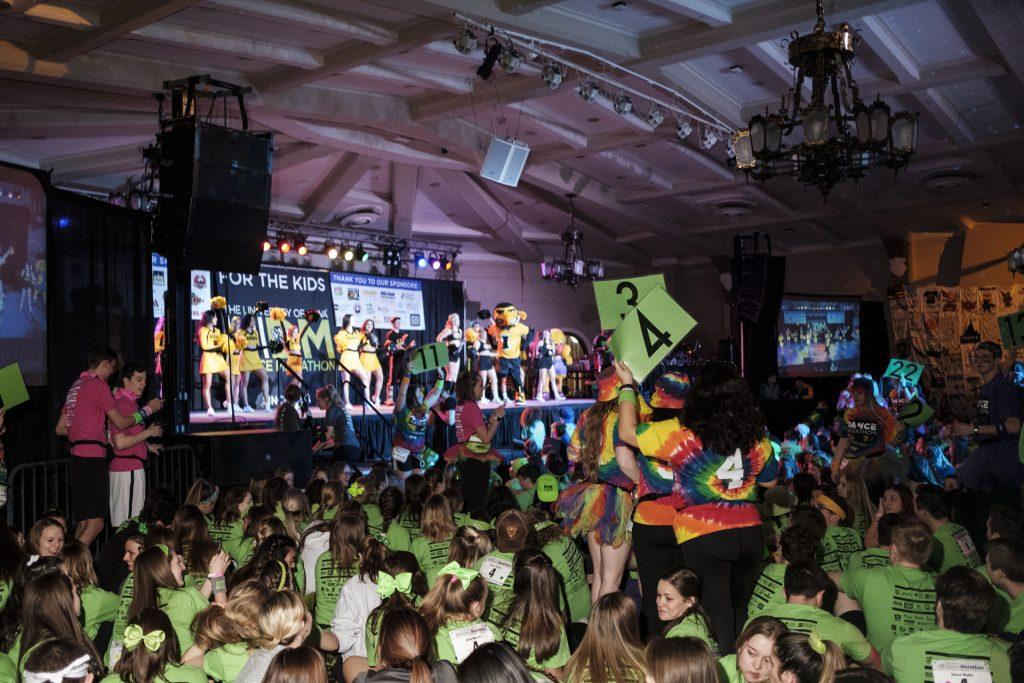 `Dancers sit on the floor in the IMU ball room before Dance Marathon 24  on Friday, Jan. 28, 2018. Dance Marathon raises money for pediatric cancer research. (Nick Rohlman/The Daily Iowan)