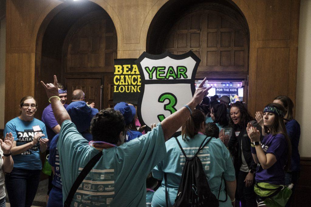 Dance Marathon Families enter the ballroom during Dance Marathon 24 at the Iowa Memorial Union on Friday, Jan. 28, 2018. Dance Marathon raises money for pediatric cancer research. (Nick Rohlman/The Daily Iowan)