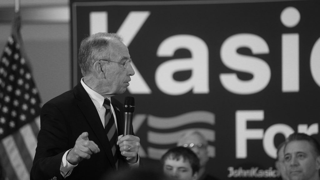 Sen. Chuck Grassley, R-Iowa, introduces Republican presidential candidate John Kasich during a rally at the National Czech and Slovak Museum and Library in Cedar Rapids on Friday, Jan. 29, 2016. Kasich briefly ran in the 2000 presidential election. (The Daily Iowan/Margaret Kispert)