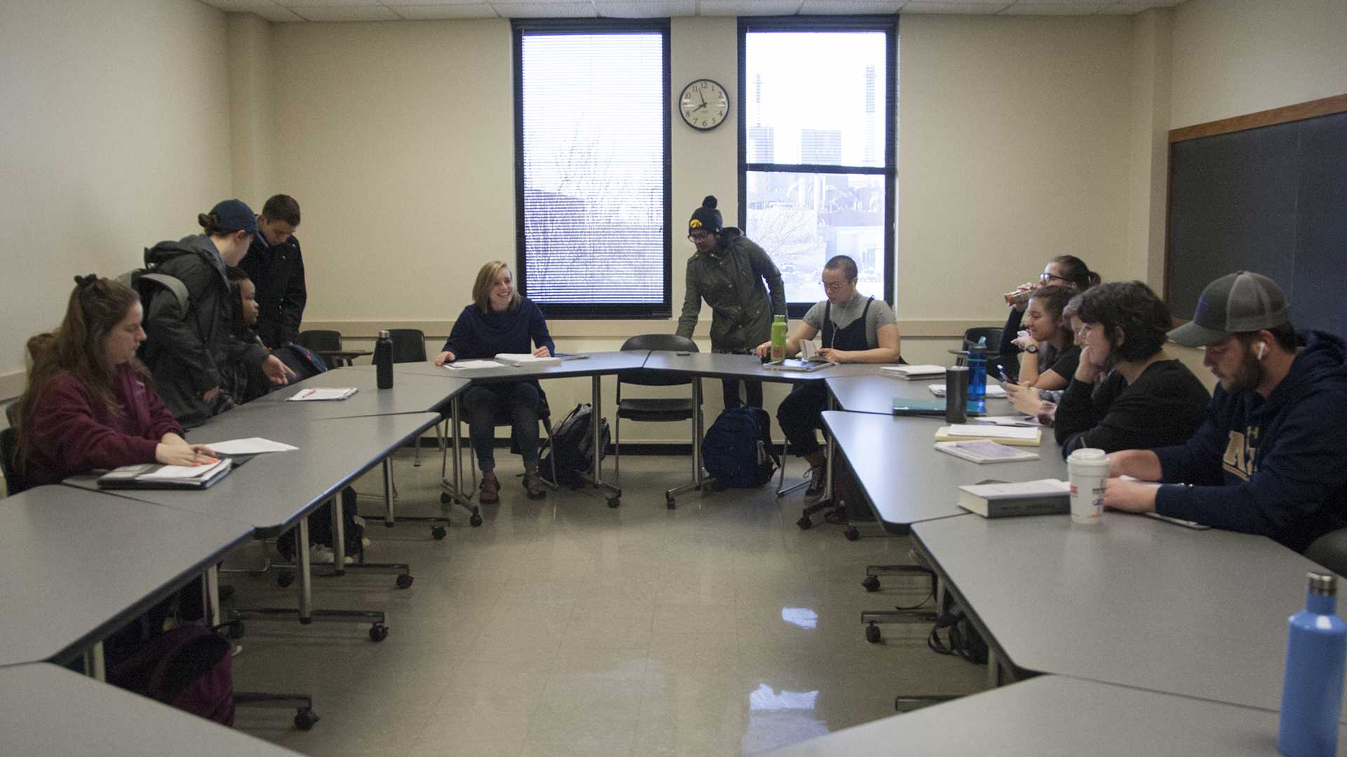 Students prepare before their Foundations of Creative Writing class on Feb. 27, 2018. Foundations of Creative Writing is one of the introductory classes for the growing major that focuses mainly on critical reading and developing core writing skills. (Katie Goodale/The Daily Iowan)