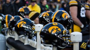 Iowa football helmets line the sidelines during a game against Purdue University on Saturday, Nov. 18, 2017. The Boilermakers defeated the Hawkeyes 24 to 15.