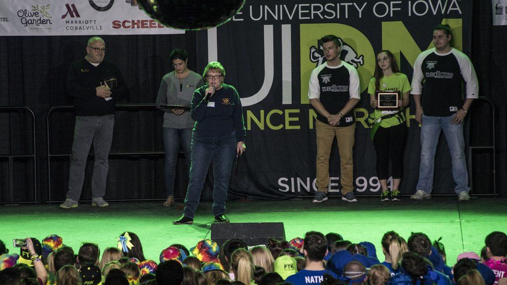Mary Peterson presents awards for biggest individual fundraising efforts during UI Dance Marathon 24 inside the IMU on Saturday, Feb. 3, 2018. (Ben Allan Smith/The Daily Iowan)
