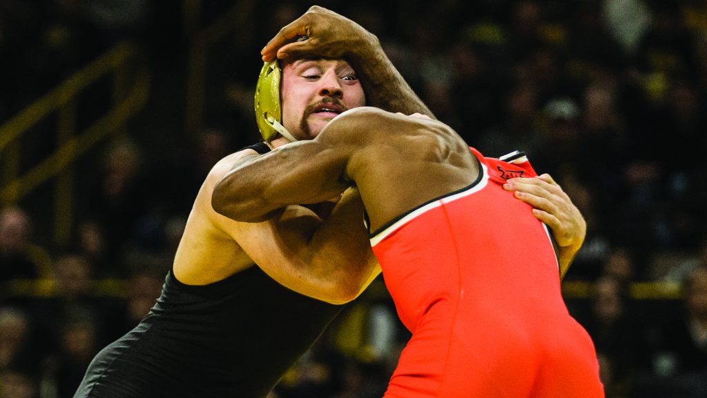 Iowas 174-pound Joey Gunther competes during the NCAA wrestling match between Iowa and Oklahoma State at Carver-Hawkeye Arena on Sunday, Jan. 24, 2018. The Hawkeyes beat No. 3 OSU 20-12. (Ben Allan Smith/The Daily Iowan)