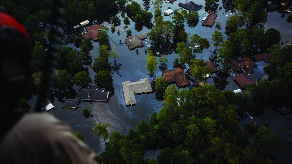 Rising floodwater engulfs entire residential neighborhoods in the aftermath of Tropical Storm Harvey near Lumberton, Texas, on Thursday, Aug. 31, 2017. (Marcus Yam/Los Angeles Times/TNS)