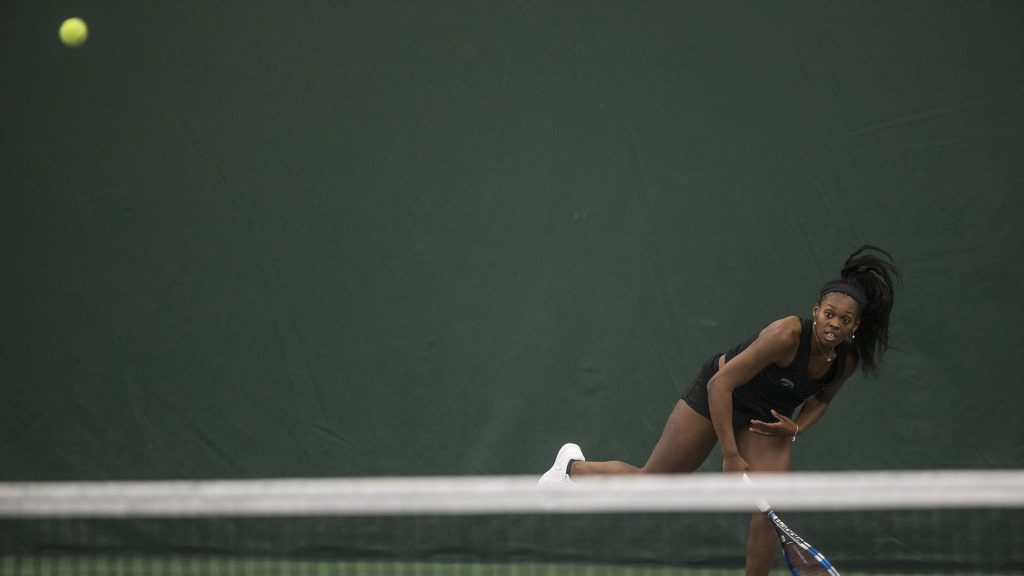 Iowa junior Adorabol returns the ball during the NCAA women's tennis match between Iowa and Creighton at the Hawkeye Tennis and Recreation Complex on Saturday, Jan. 20, 2018. (Ben Allan Smith/The Daily Iowan)