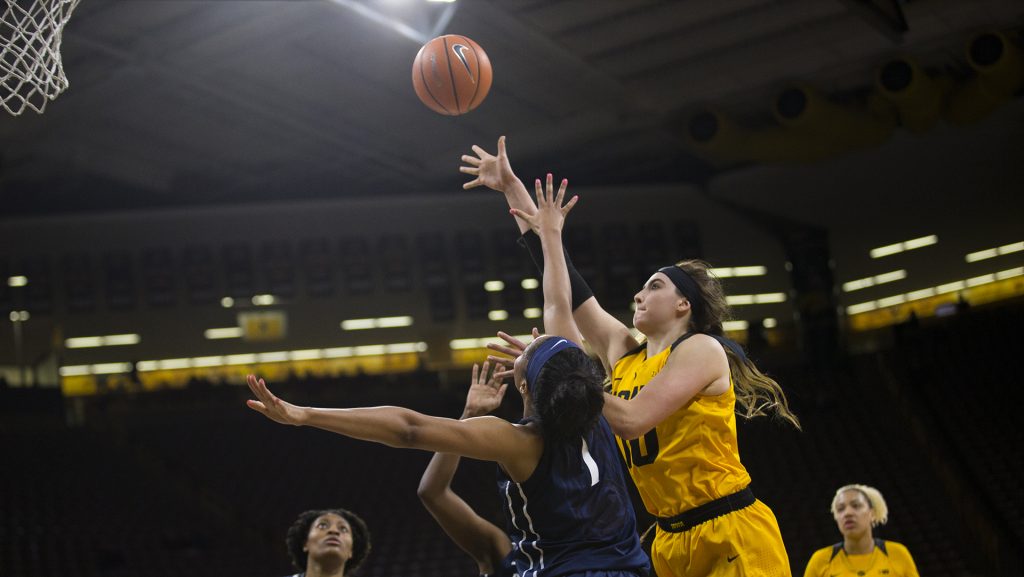 Iowa forward Megan Gustafson goes for an rebound during the Iowa/Penn State basketball game at Carver-Hawkeye Arena on Thursday, Feb. 8, 2018. The Hawkeyes defeated the Nittany Lions, 80-76.  (Lily Smith/The Daily Iowan)