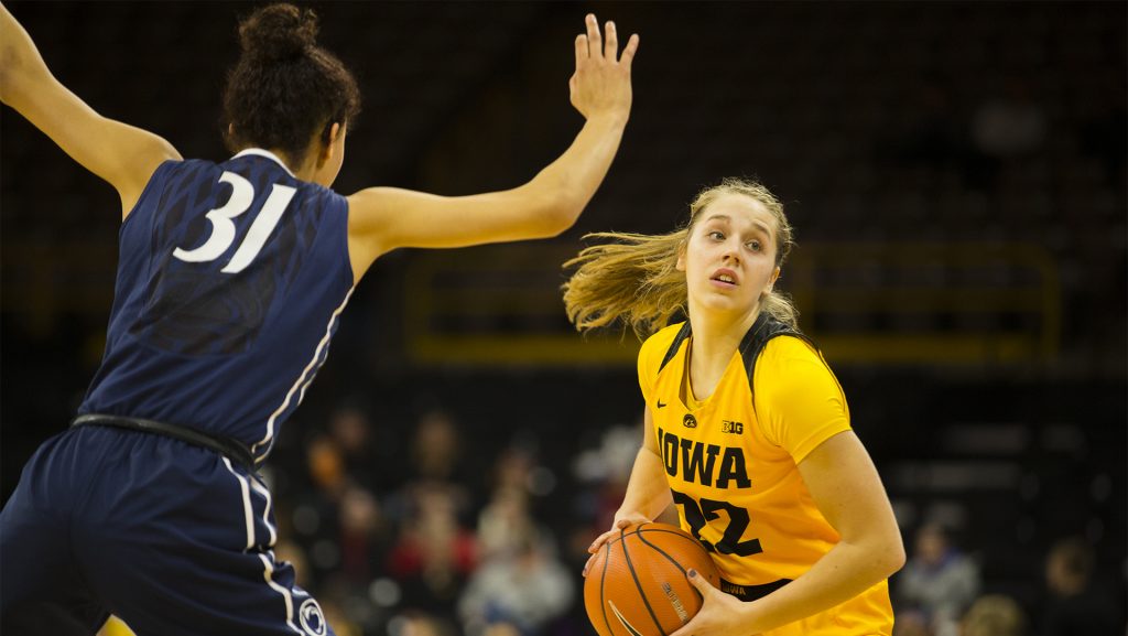 Iowa guard Kathleen Doyle looks to pass the ball during the Iowa/Penn State basketball game at Carver-Hawkeye Arena on Thursday, Feb. 8, 2018. The Hawkeyes defeated the Nittany Lions, 80-76.  (Lily Smith/The Daily Iowan)