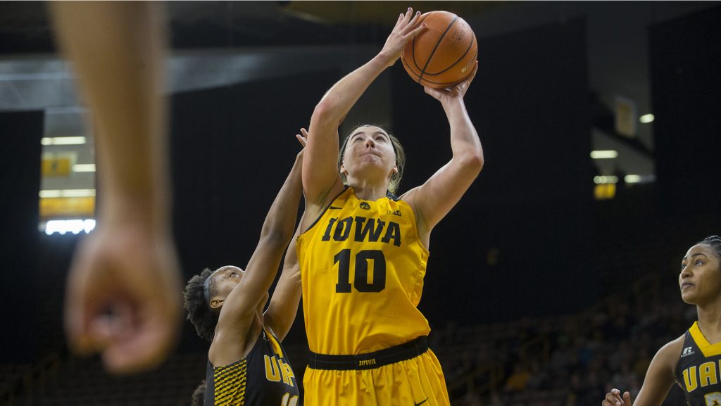 Iowa forward Megan Gustafson attempts a shot during the Iowa/Arkansas-Pine Bluff basketball game in Carver-Hawkeye Arena on Saturday, Dec. 9, 2017. The Hawkeyes defeated the Golden Lions, 85-45. (Lily Smith/The Daily Iowan)