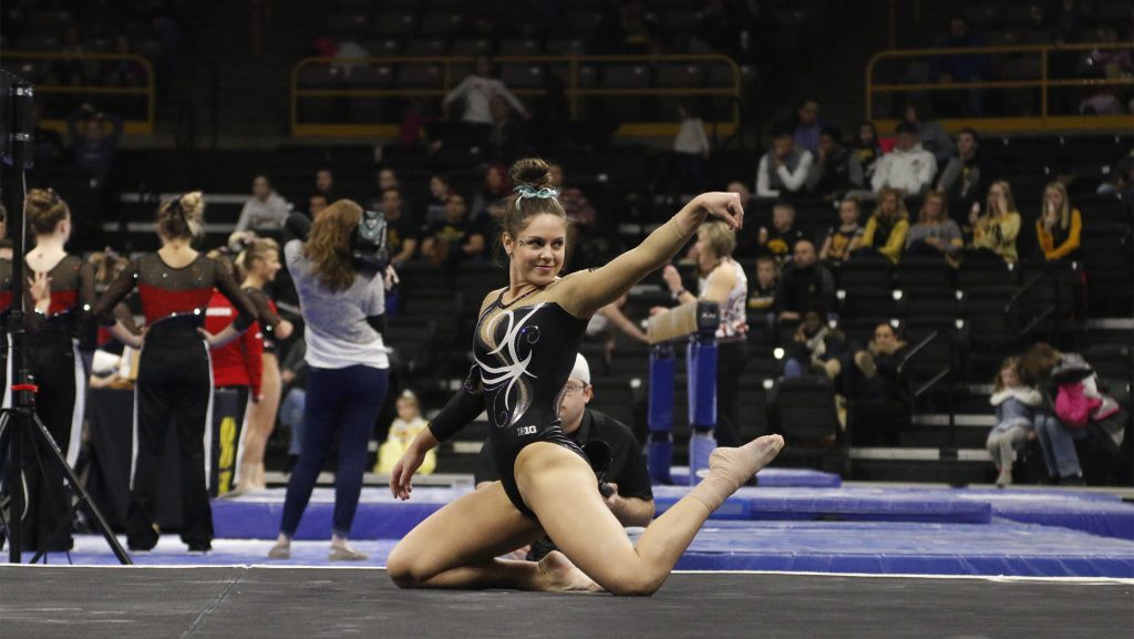 during the Iowa/Nebraska meet at Carver-Hawkeye Arena on Saturday, Feb. 10, 2018. The Cornhuskers defeated the Hawkeyes with 195.675 to 194.900. (Katina Zentz/The Daily Iowan)