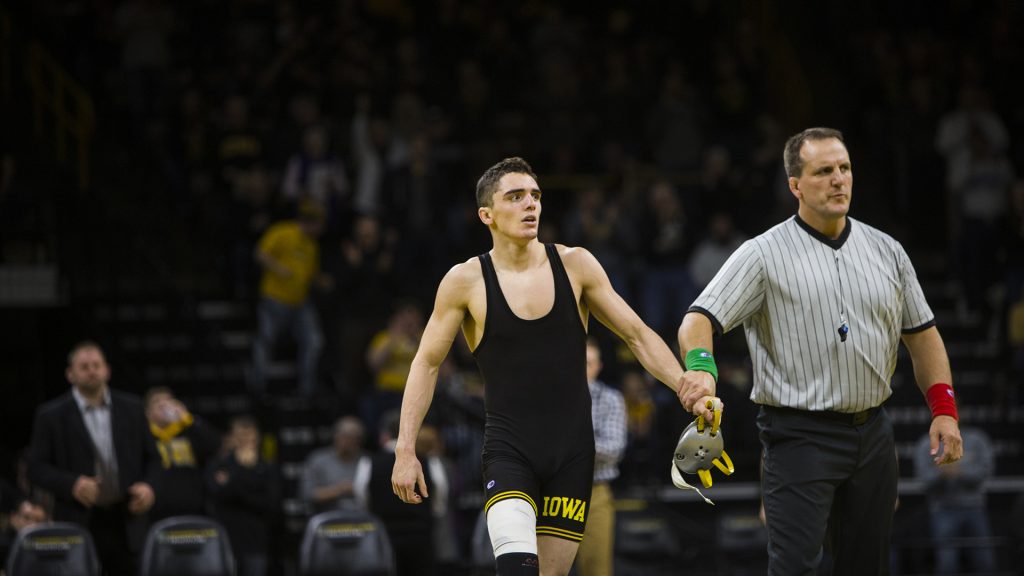 Iowa%E2%80%99s+133-pound+Paul+Glynn+has+his+hand+raised+after+defeating+Michigan+State%E2%80%99s+Matt+Santos+during+an+Iowa%2FMichigan+State+wrestling+matchup+in+Carver-Hawkeye+Arena+on+Friday%2C+Jan.+5%2C+2018.+Glynn+pinned+Santos+in+6%3A13.+%28Joseph+Cress%2FThe+Daily+Iowan%29