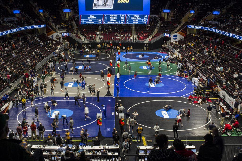 Wrestlers+warm+up+before+Session+2+of+the+NCAAs+Wrestling+Championships+at+Quicken+Loans+Arena+in+Cleveland%2C+OH+on+Thursday%2C+March+15%2C+2018.+%28Ben+Allan+Smith%2FThe+Daily+Iowan%29