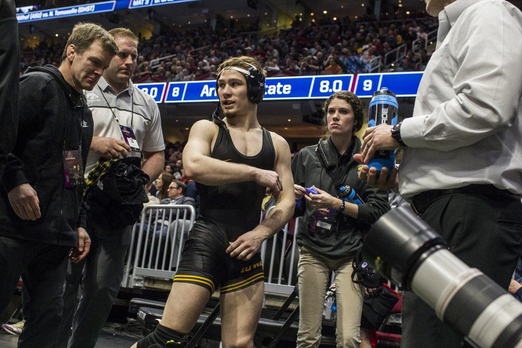 Iowas 125-pound Spencer Lee walks off the mat after defeating Purdues Luke Welch during Session 2 of the NCAAs Wrestling Championships at Quicken Loans Arena in Cleveland, Ohio on Thursday, March 15, 2018. 