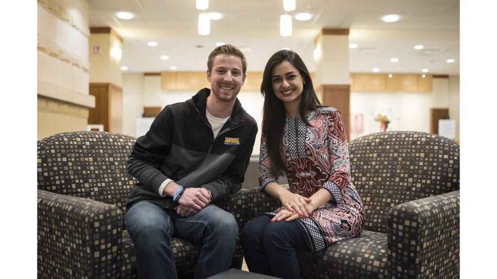 UISG Vice President, Heath Schintler, and President, Hira Mustafa, pose for portraits inside the Hubbard Commons of the IMU following the election results on Friday, March 30, 2018. Schintler and Mustafa are running on the Surge Party ticket who won the UISG election for the year 2018-19. (Ben Allan Smith/The Daily Iowan)