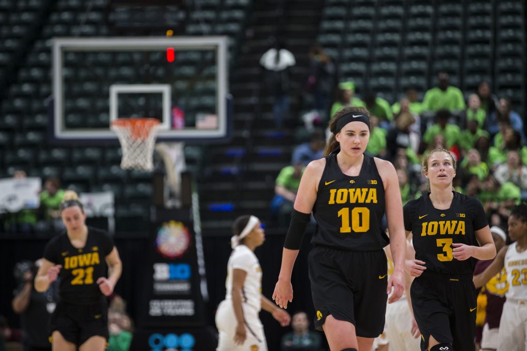 Iowa+forward+Megan+Gustafson+walks+towards+the+huddle+during+a+timeout+during+the+Iowa%2FMinnesota+Big+Ten+tournament+basketball+game+at+Bankers+Life+Fieldhouse+in+Indianapolis+on+Friday%2C+March%2C+2%2C+2018.+The+Golden+Gophers+defeated+the+Hawkeyes%2C+90-89.+%28Lily+Smith%2FThe+Daily+Iowan%29