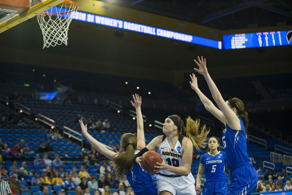 Iowa forward Megan Gustafson attempts a shot during the Iowa/Creighton NCAA tournament first round basketball game at Pauley Pavilion on UCLAs campus in Los Angeles on Saturday, March 17, 2018. The Bluejays defeated the Hawkeyes, 76-70. (Lily Smith/The Daily Iowan)