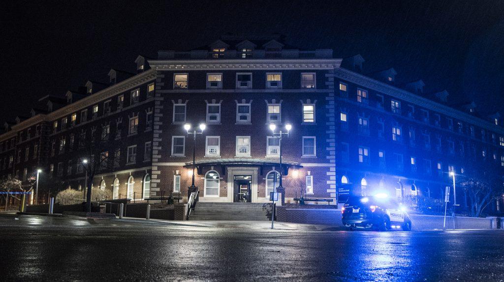 Iowa City and University of Iowa police respond to loud bangs at Currier Residence Hall on Wednesday, Feb. 28, 2018. No suspicious activity was reported by emergency services following an inspection of the building. (Ben Allan Smith/The Daily Iowan)