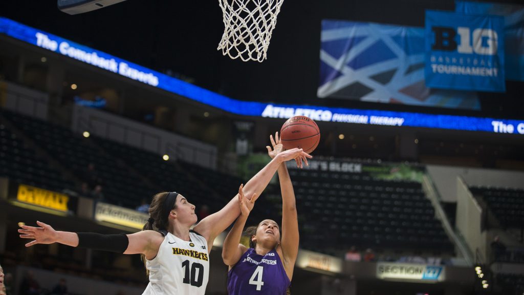 Iowa+forward+Megan+Gustafson+blocks+a+shot+from+Northwestern+forward+Bryana+Hopkins+during+the+Iowa%2FNorthwestern+Big+Ten+tournament+basketball+game+at+Bankers+Life+Fieldhouse+in+Indianapolis+on+Thursday%2C+March%2C+1%2C+2018.+The+Hawkeyes+defeated+the+Wildcats%2C+55-45.+Iowa+takes+on+No.4+Minnesota+on+Friday.+%28Lily+Smith%2FThe+Daily+Iowan%29