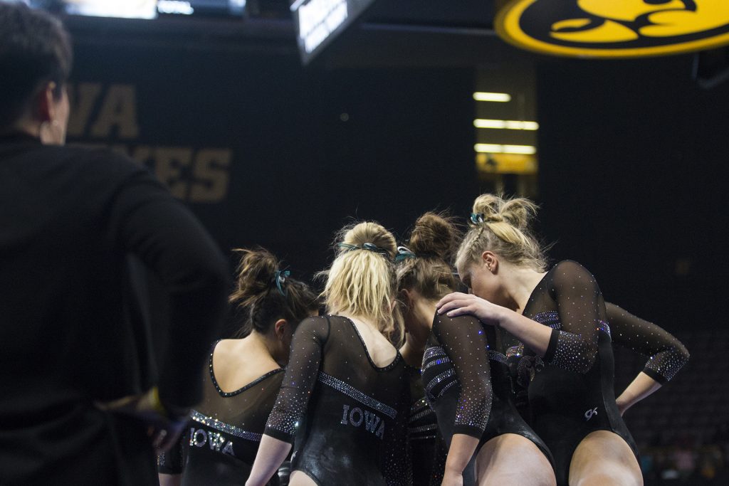 Iowa+gymnasts+meet+up+before+performing+during+the+Iowa%2FSoutheast+Missouri+State+gymnastics+meet+at+Carver-Hawkeye+Arena+on+Friday%2C+Mar.+02%2C+2018.+The+GymHawks+defeated+the+Redhawks%2C+195.550-192.750.+%28Katina+Zentz%2F+The+Daily+Iowan%29