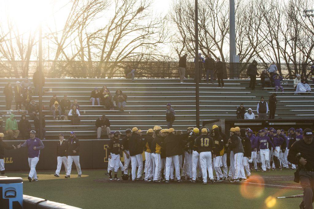 Iowa players celebrate the win during men's baseball Iowa vs. Loras at Duane Banks Field on March 21, 2018. The Hawkeyes defeated the Duhawks 6-4. (Katina Zentz/The Daily Iowan) (Katina Zentz/Daily Iowan)