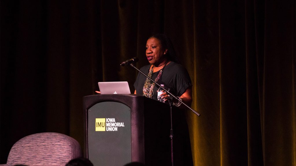 Tarana Burke, the founder of the #MeToo movement, speaks in the IMU on Tuesday. During the lecture, she spoke about her experiences regarding sexual assault and how she has advocated to stop abuse and help victims. (Megan Nagorzanski/Daily Iowan)