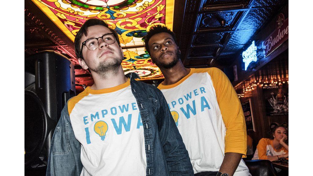 UISG City Liaison Ben Nelson and Senator Nate Robinson look on as a video introducing the Empower Iowa ticket for UISG elections is played at the BoJames bar in Iowa City on Sunday, March 18, 2018. The Empower Iowa ticket features Nelson as presidential candidate and Robinson as vice-president. (Nick Rohlman/The Daily Iowan)