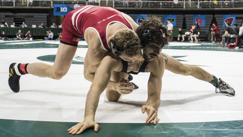 Wisconsins+141-pound+Eli+Stickley%2C+left%2C+scores+two+on+Iowas+Vince+Turk+during+Big+Ten+Wrestling+Championships+Day+1+at+the+Breslin+Student+Events+Center+in+East+Lansing%2C+MI+on+Saturday%2C+Mar.+3%2C+2018.+%28Ben+Allan+Smith%2FThe+Daily+Iowan%29