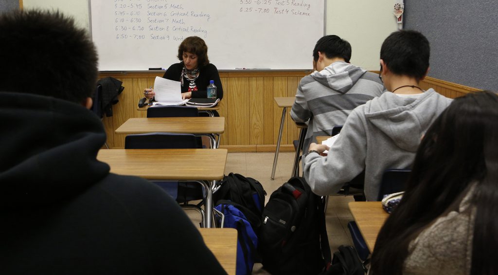 Teacher Svetlana Djananova monitors students as they take an ACT test in preparation for the college admission exam at HS2 Academy in Arcadia, Calif. (Anne Cusack/Los Angeles Times/TNS)