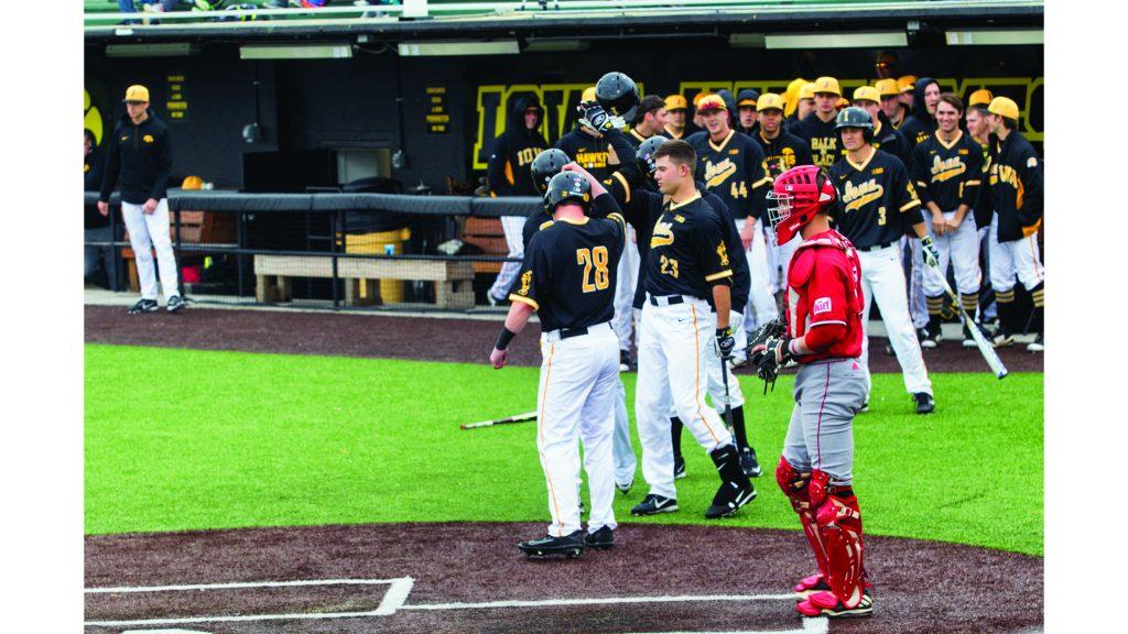 Hawkeye defeated Bradley 13-9 during men baseball game between Iowa and Bradley at Duane Banks Field on Wednesday,  March 28, 2018. Hawkeye celebrated home-run. (Yue Zhang/The Daily Iowan)