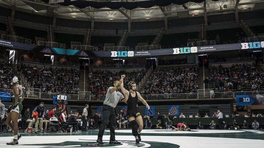 Iowas 125-pound Spencer Lee, right, beats Michigan States RayVon Foley in a fall at 2:43 during Big Ten Wrestling Championships Day 1 at the Breslin Student Events Center in East Lansing, MI on Saturday, Mar. 3, 2018. (Ben Allan Smith/The Daily Iowan)