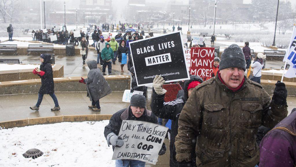Protesters march on the Iowa State Capital during the March for Our Lives in Des Moines on Saturday, March 24, 2018. (Lily Smith/The Daily Iowan)